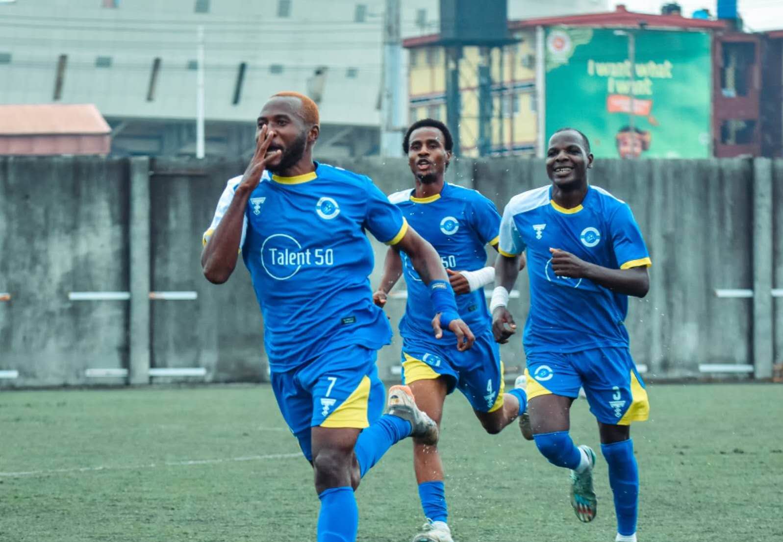 Players celebrating a goal